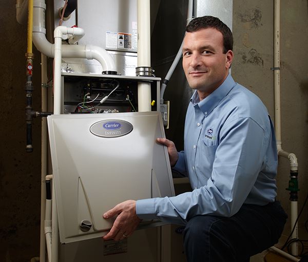 Repair technician working on a unit