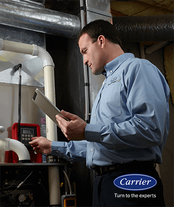 Man inspecting heating system